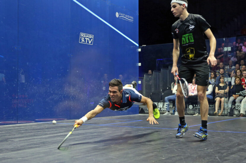 Miguel Rodriguez dives for a shot against Ali Farag during the 2018 British Open