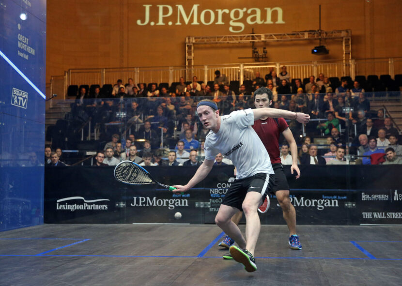 Todd Harrity (left) of the United States takes on Tsz Fung Yip (right) during the 2019 J.P. Morgan Tournament of Champions